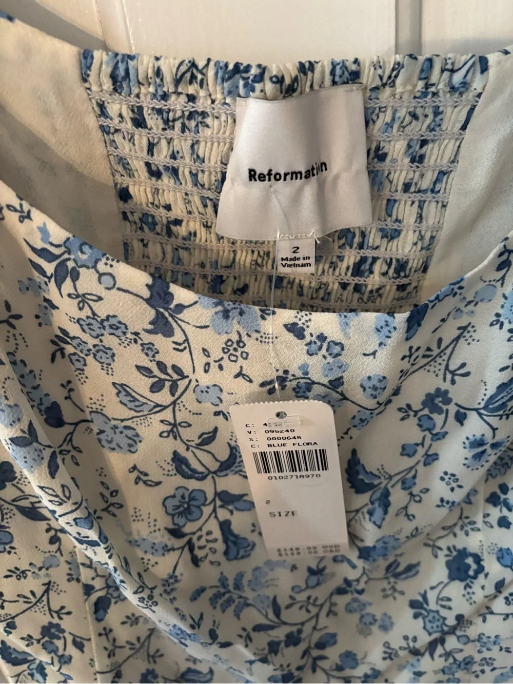 Reformation Cream Blouse with Blue Floral Puff Sleeves